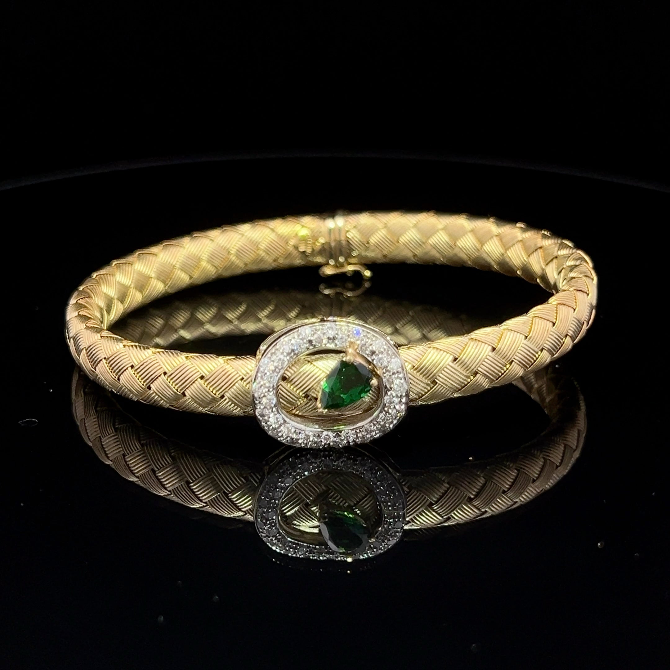 VINTAGE 14 KARAT BICOLOR YELLOW GOLD TSAVORITE AND DIAMOND BRACELET
