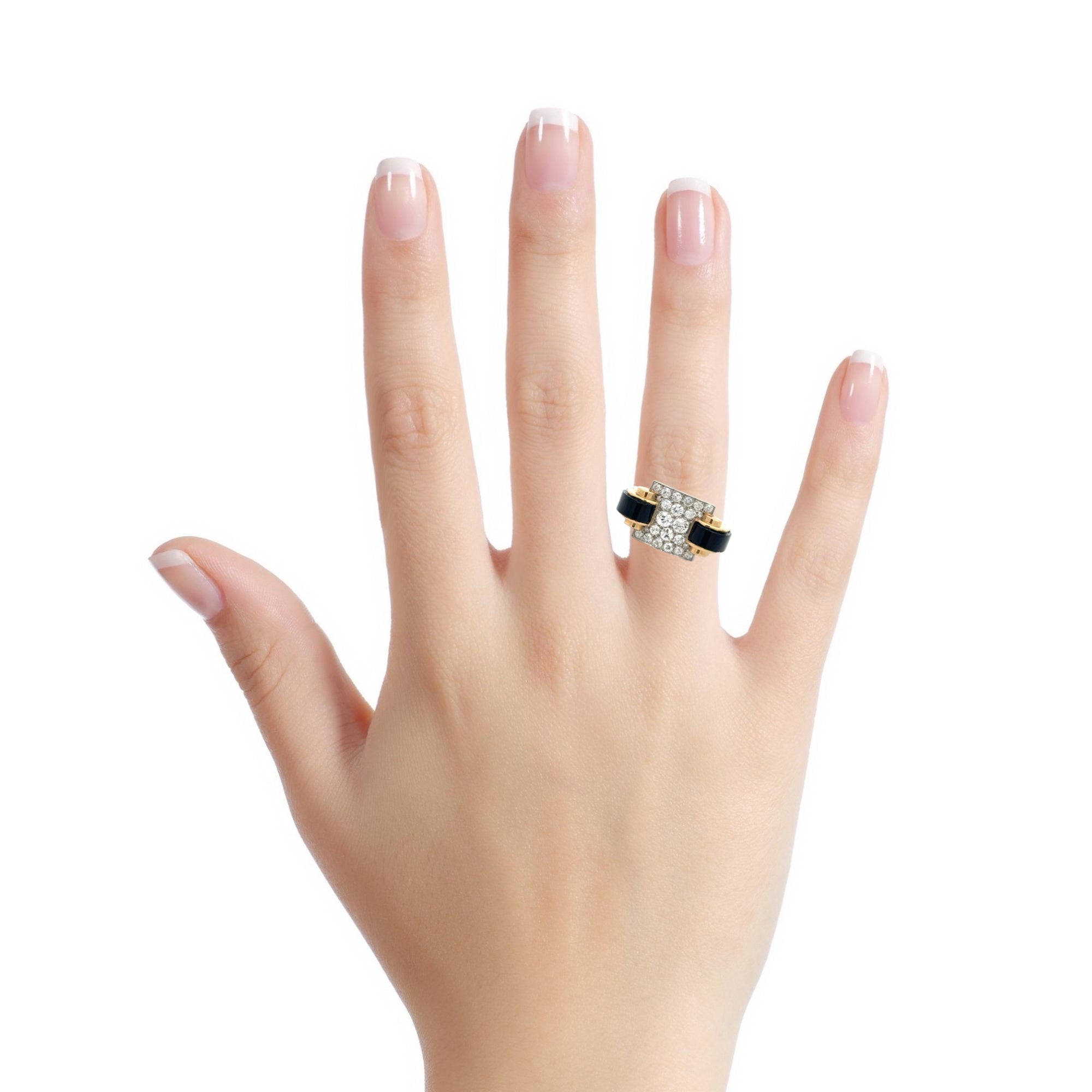 18 KARAT GOLD, PLATINUM DIAMOND AND ONYX VINTAGE RING