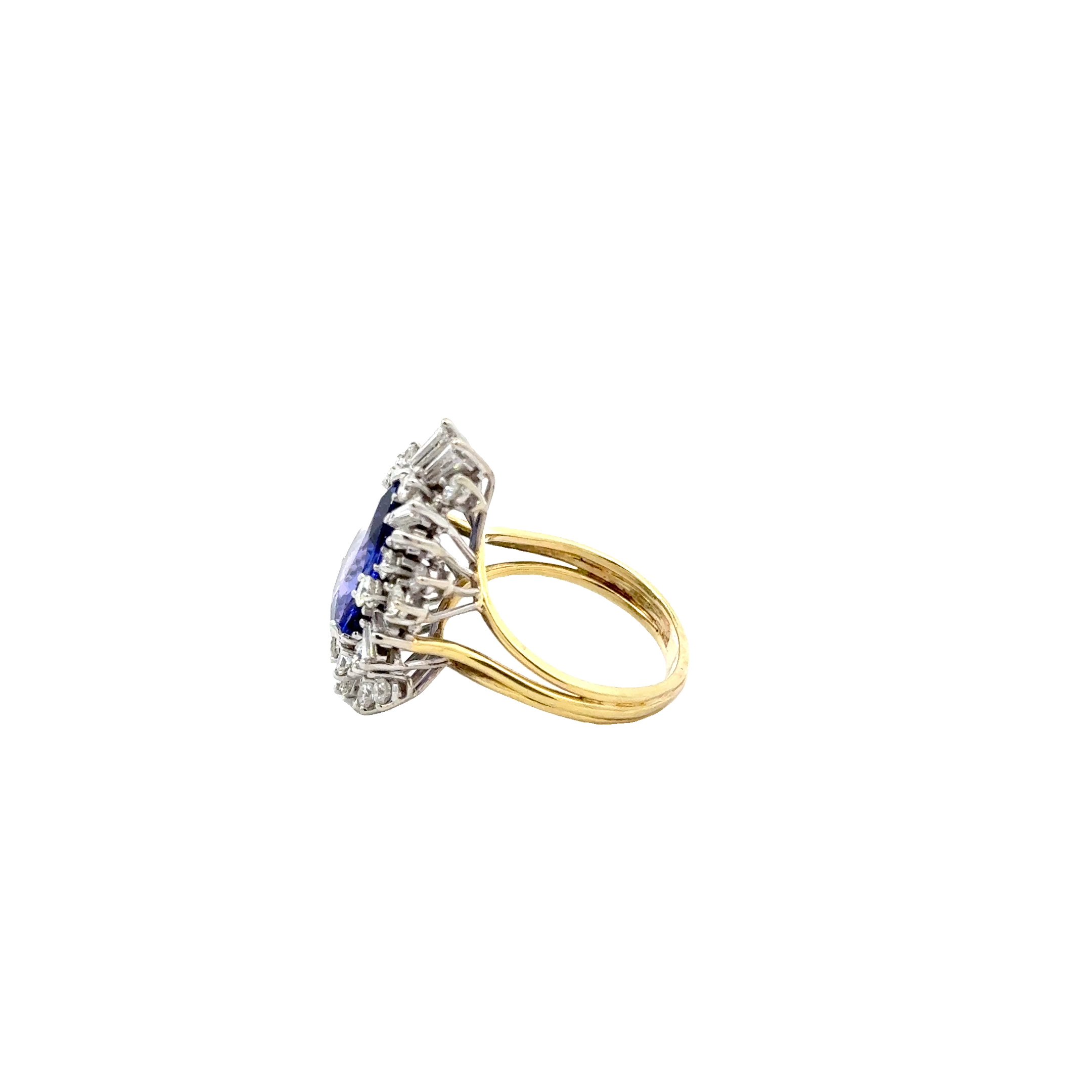 18 KARAT TANZANITE AND DIAMOND RING