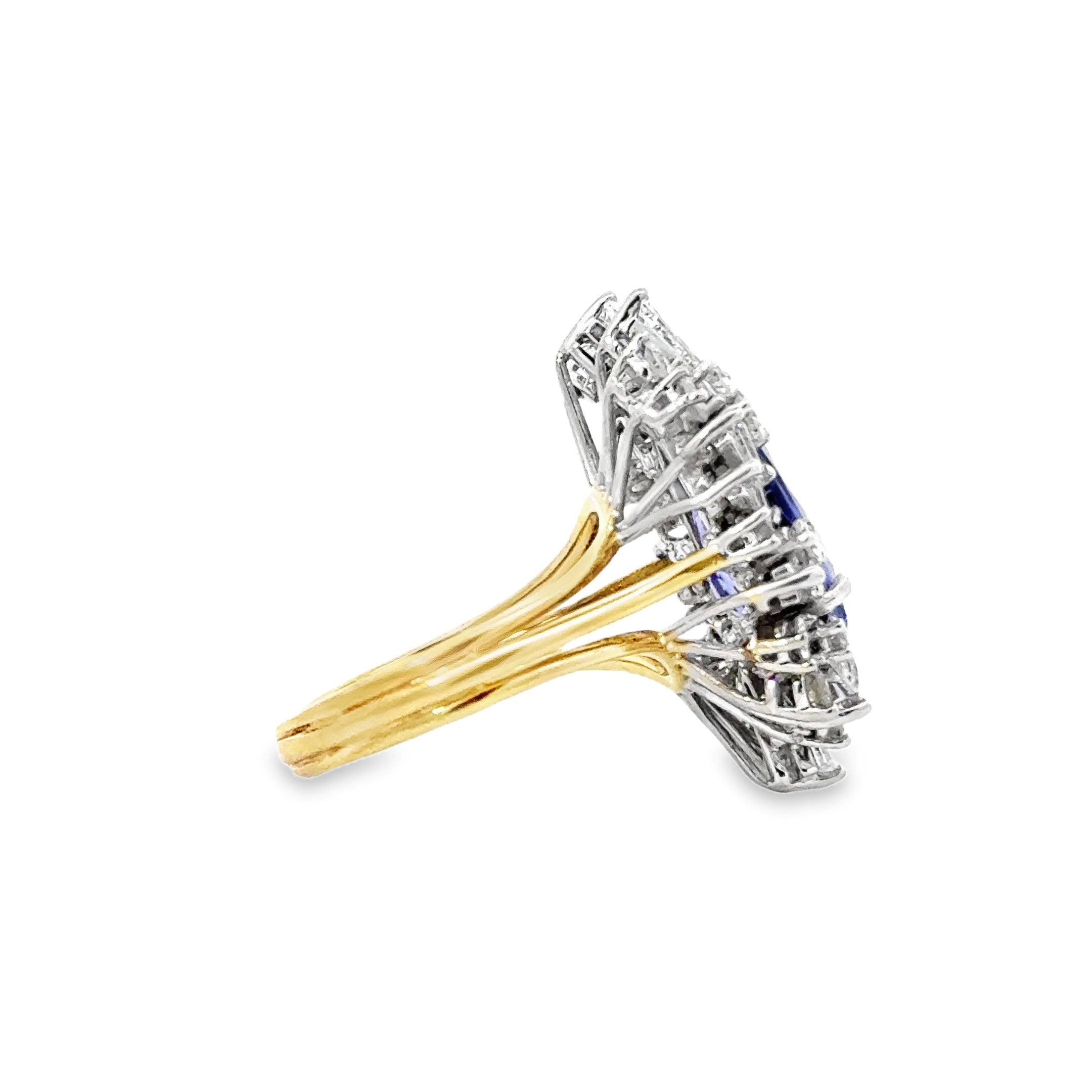 18 KARAT TANZANITE AND DIAMOND RING