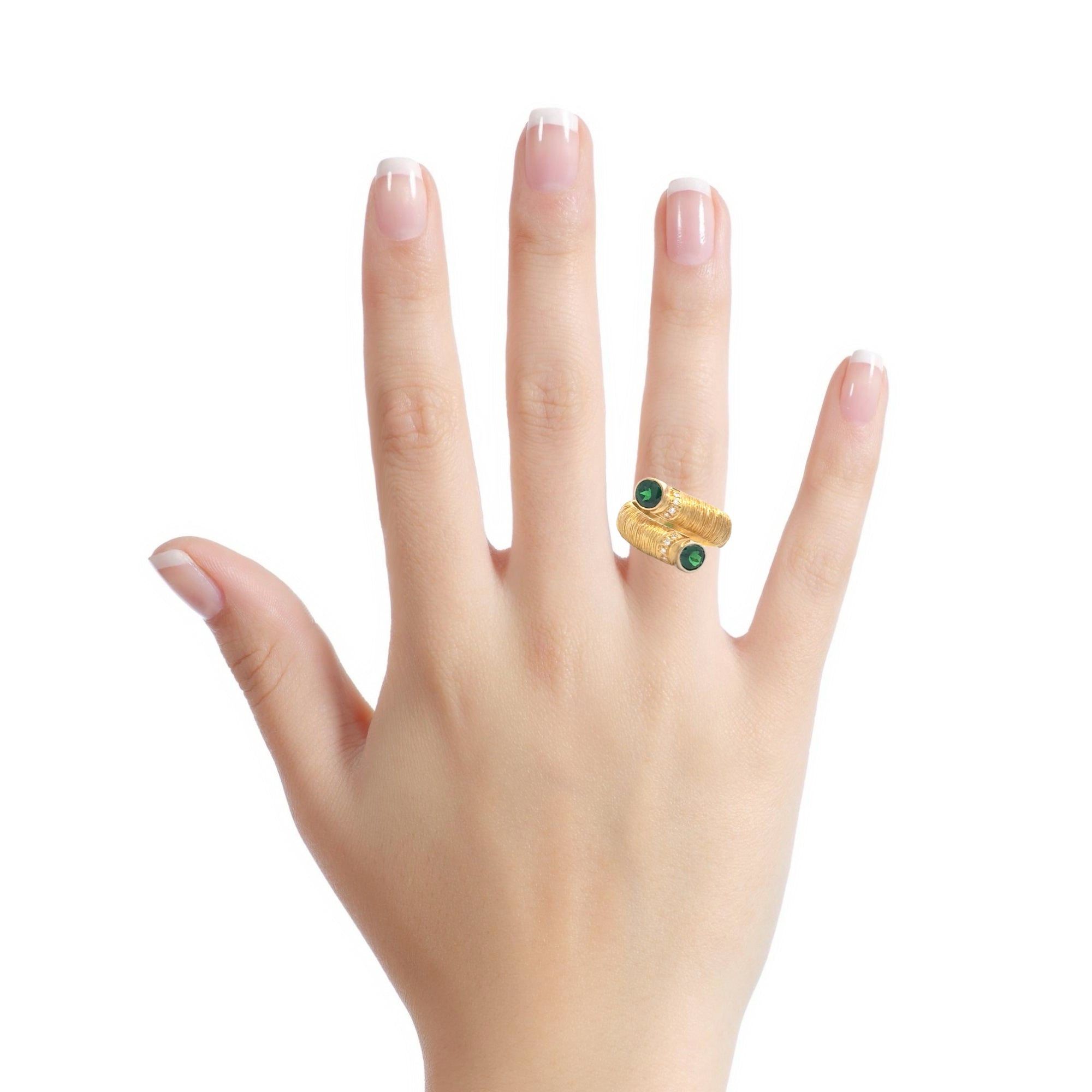 18 KARAT BYPASS TSAVORITE AND DIAMOND RING