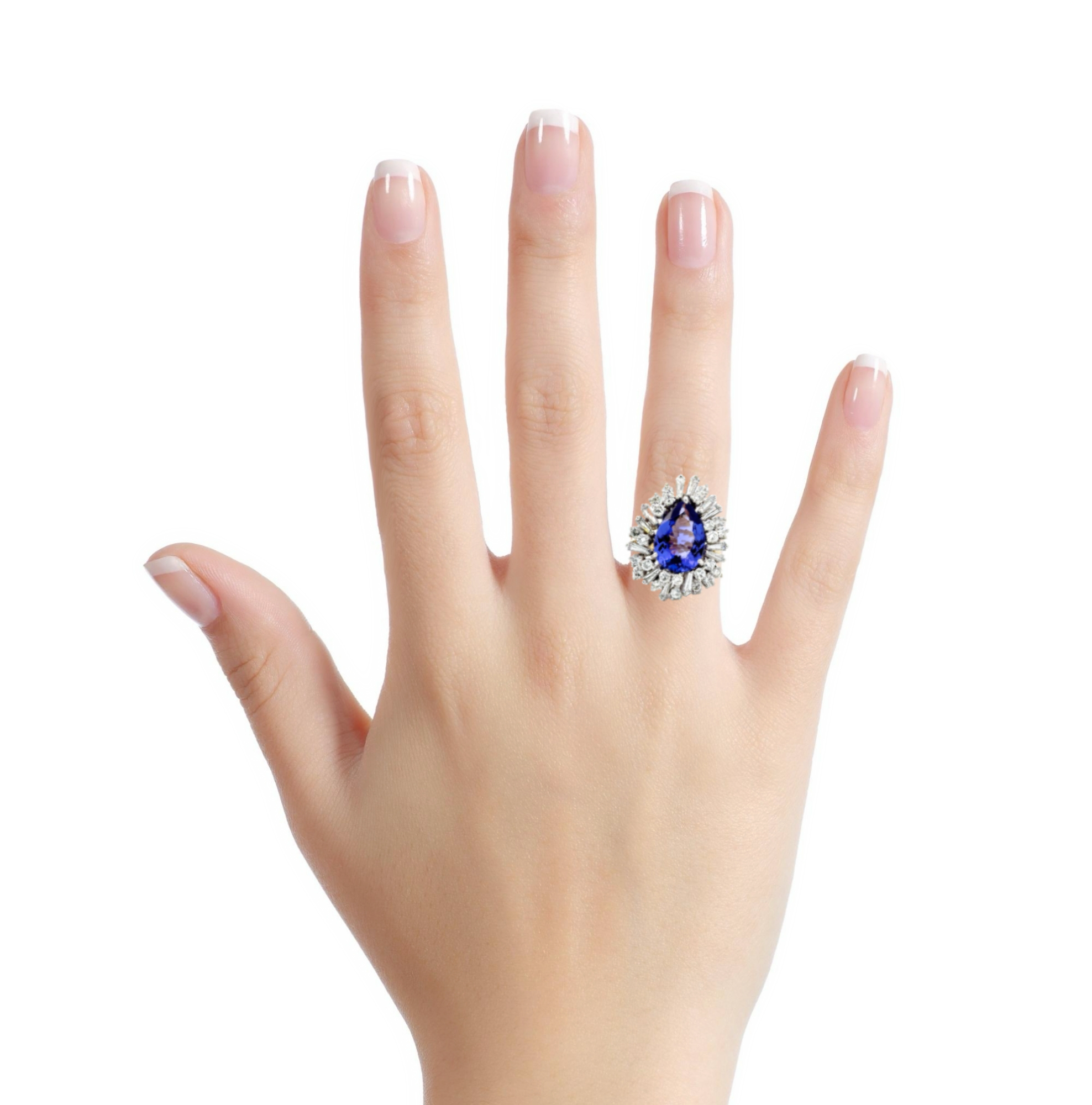 18 KARAT TANZANITE AND DIAMOND RING